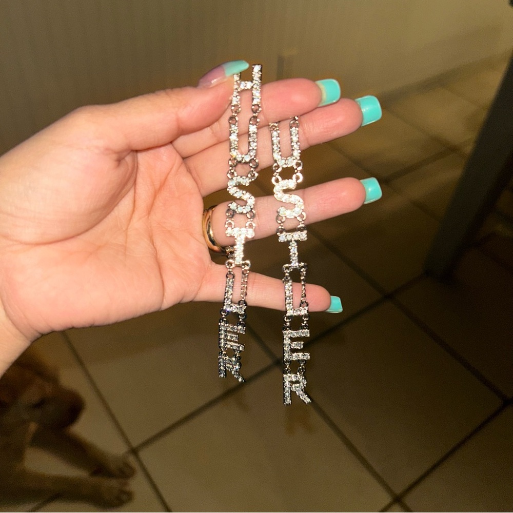 Hustler hollywood earrings